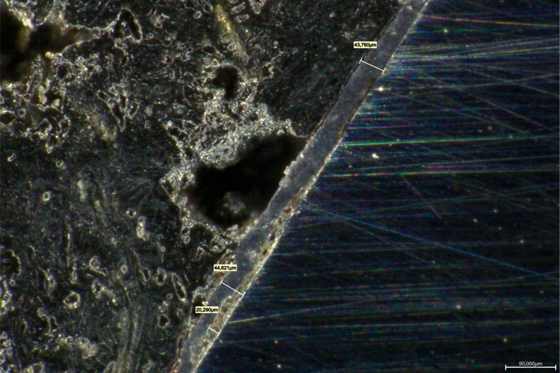 Микрофотография среза внутренней резьбовой поверхности муфты НКТ с покрытием MODENGY 1014